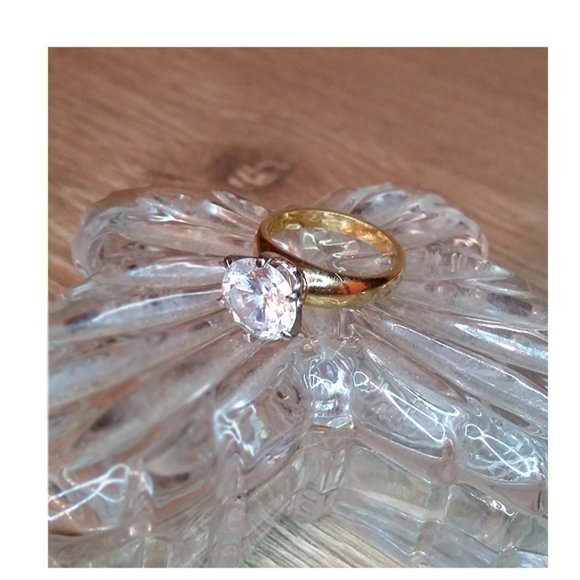 Faux diamond prong gold tone costume ring